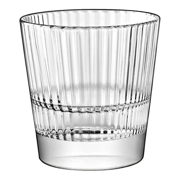 A clear Vidivi Diva stackable rocks glass with a ribbed design.