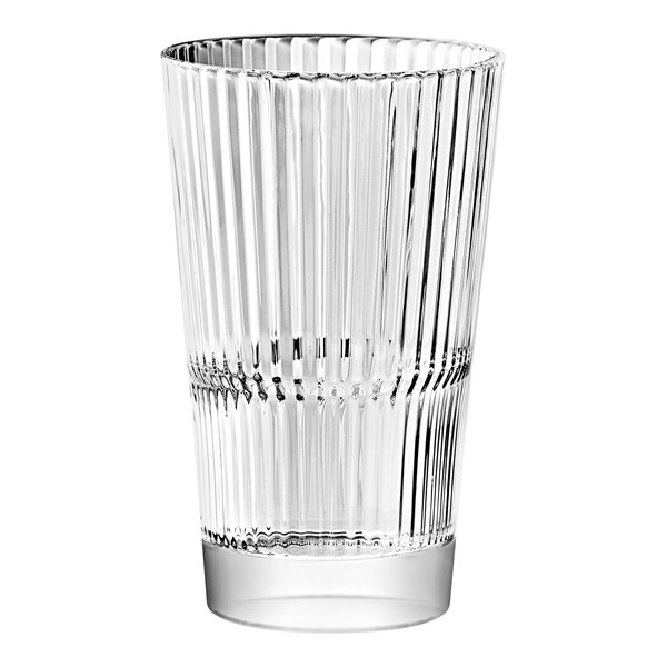 A close-up of a Vidivi Diva stackable long drink glass with a wavy design.