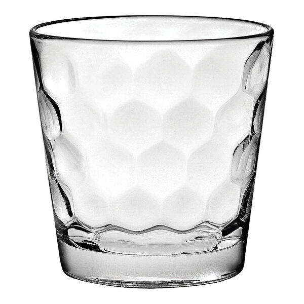A clear Vidivi Honey rocks glass with a hexagon pattern.