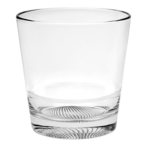 A clear Vidivi stackable rocks glass with a swirl pattern.