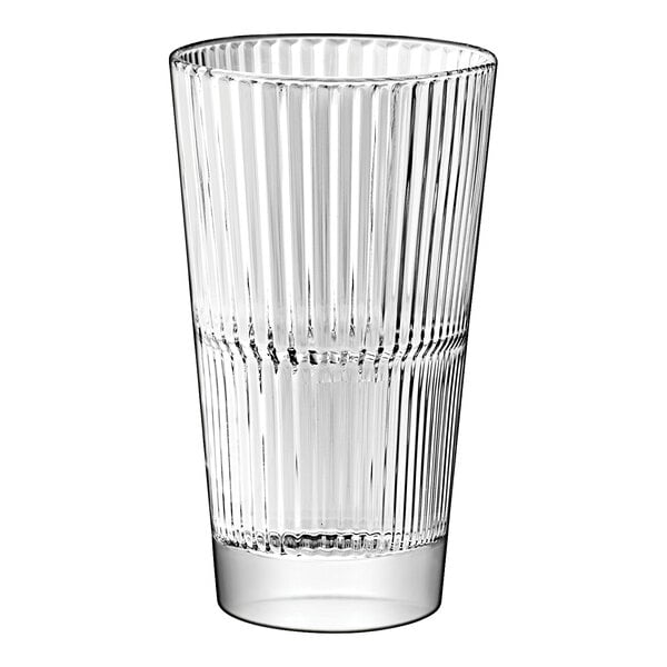 A close-up of a Vidivi Diva stackable highball glass with a wavy design.