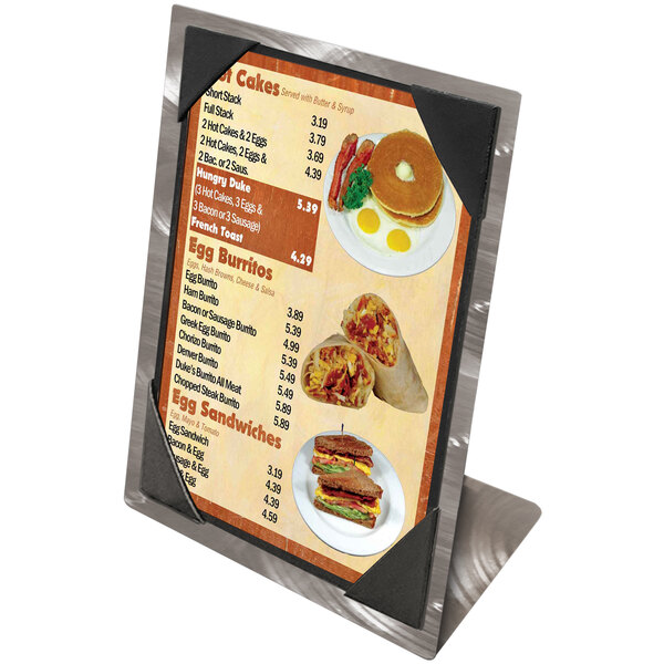 An Alumitique aluminum menu tent on a counter with a picture of food.