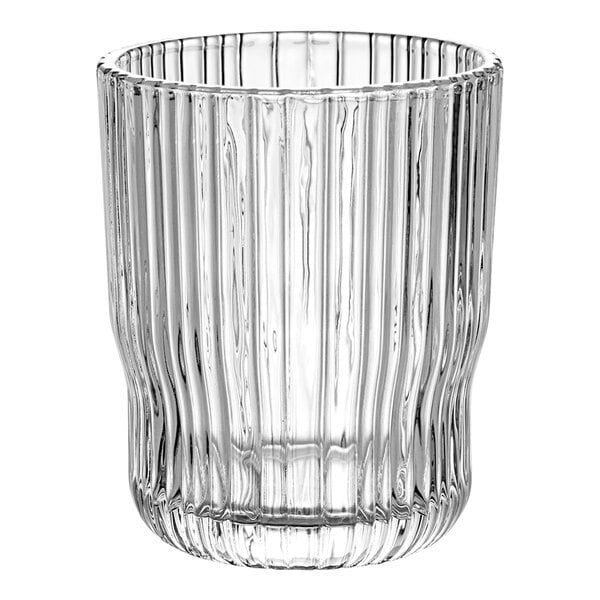 A clear glass tumbler with a ribbed rim.