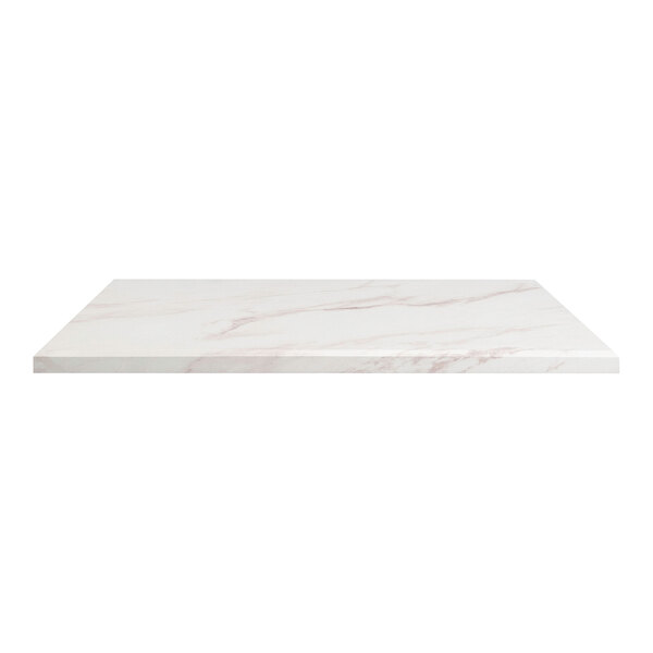 A white rectangular marble table top with copper accents.