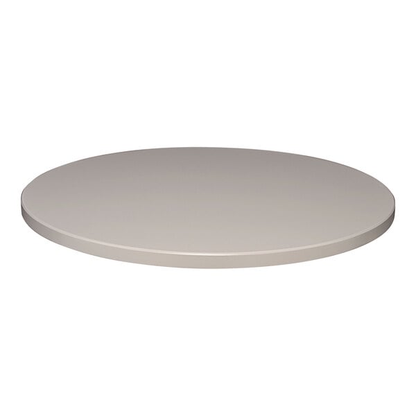 A Perfect Tables 24" Outdoor Round Stone Gray Table Top on a table.