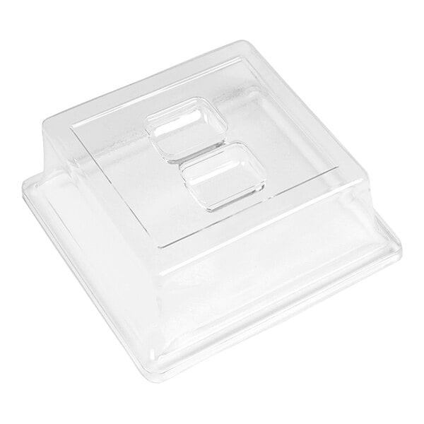 A clear plastic square cover on a clear plastic container.