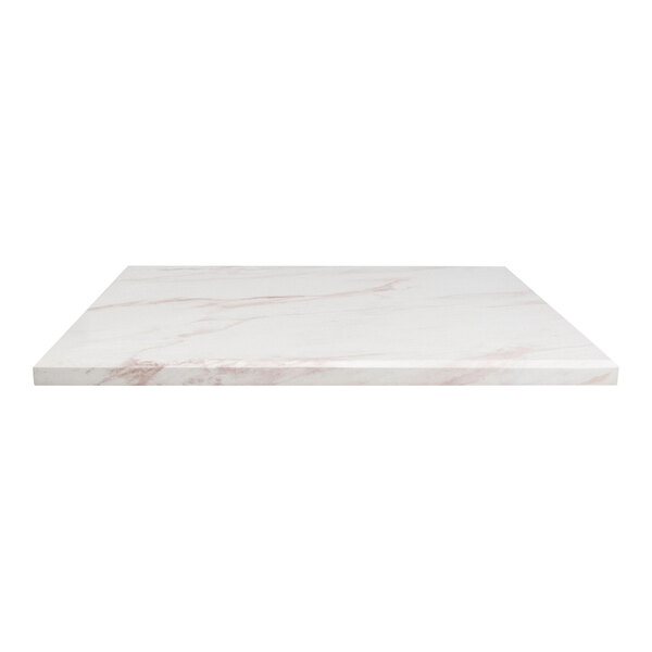 A white marble table top with copper and pink accents.