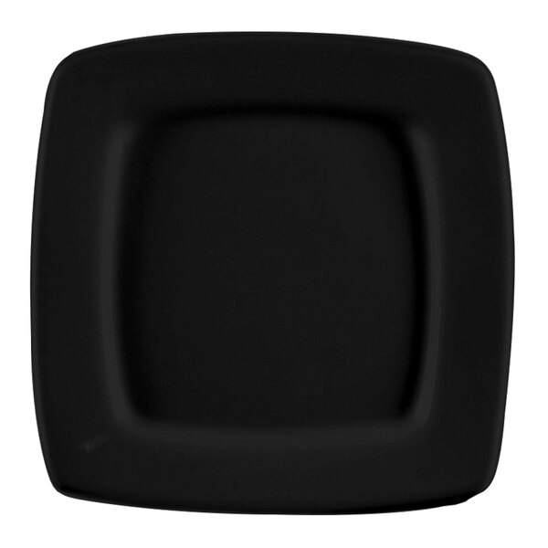 A close up of a black CAC square plate with a black rim.