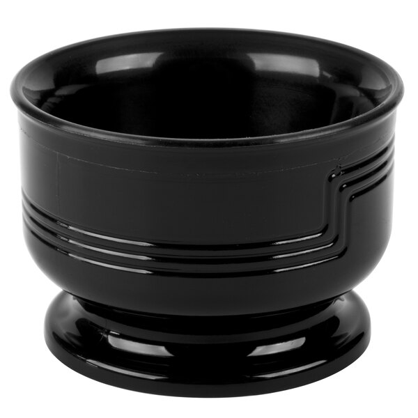 A black bowl with a stand.