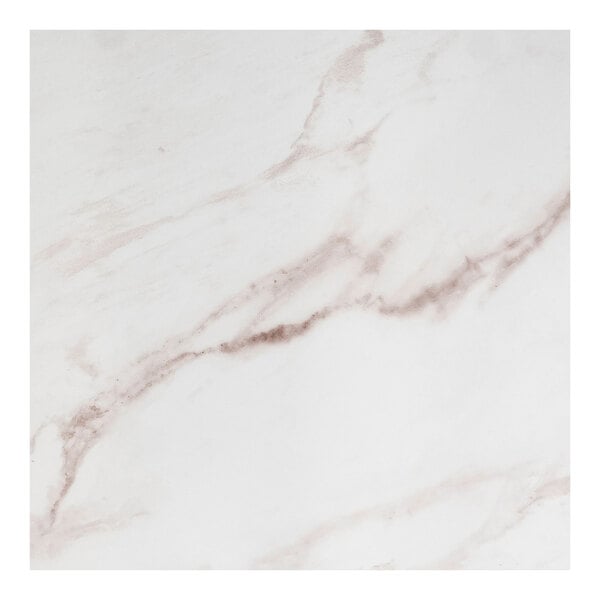 A white marble table top with pink and brown veins.