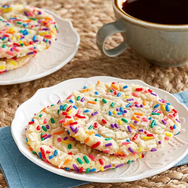 A plate of cookies with Bake-Stable Rainbow Sprinkles on it.