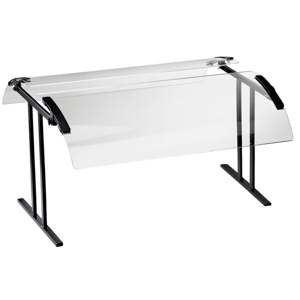 A Cal-Mil black double-face tabletop sneeze guard on a clear glass table with black metal legs.