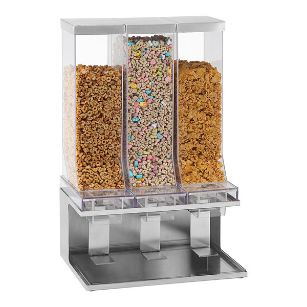 A Cal-Mil stainless steel triple canister cereal dispenser filled with cereal.