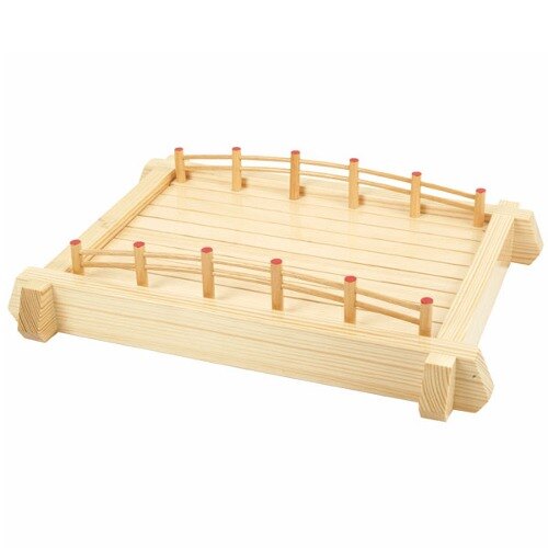 A Thunder Group wooden bridge platter with red pegs on it.