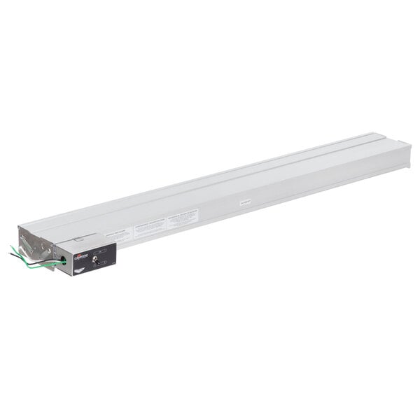 A long white metal rectangular infrared food warmer with a rectangular green light.