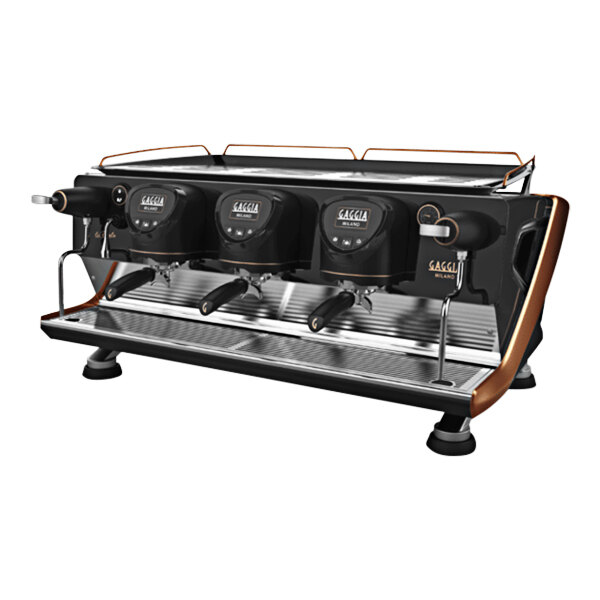 A black and silver Gaggia La Reale espresso machine on a counter with two coffee cups on top.