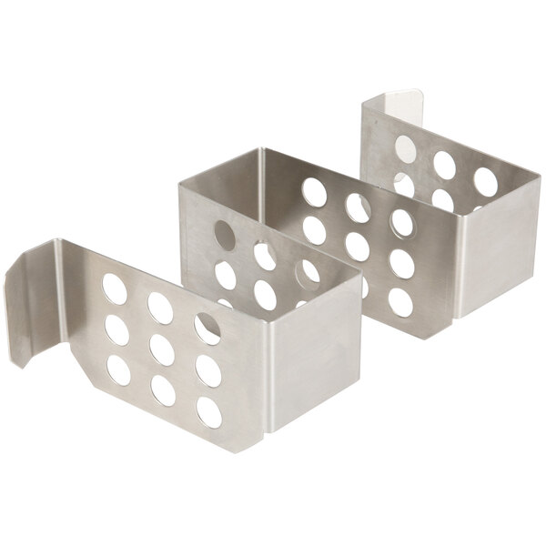 A stainless steel Nemco Divider with holes for ice cream dipper wells.