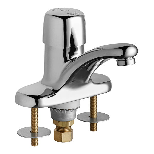 A Chicago Faucets deck-mounted metering faucet with a chrome finish and a single handle.
