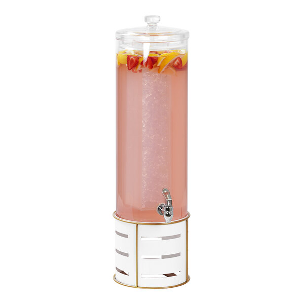 A white and pink Cal-Mil beverage dispenser with fruit inside.