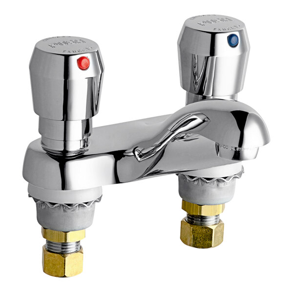 A Chicago Faucets metering faucet with two handles and valves on a white background.