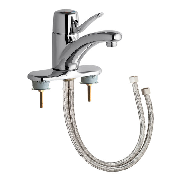 A silver Chicago Faucets deck-mounted faucet with hoses attached.