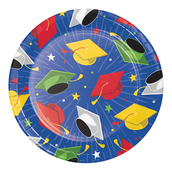A white paper plate with graduation caps and stars on it.