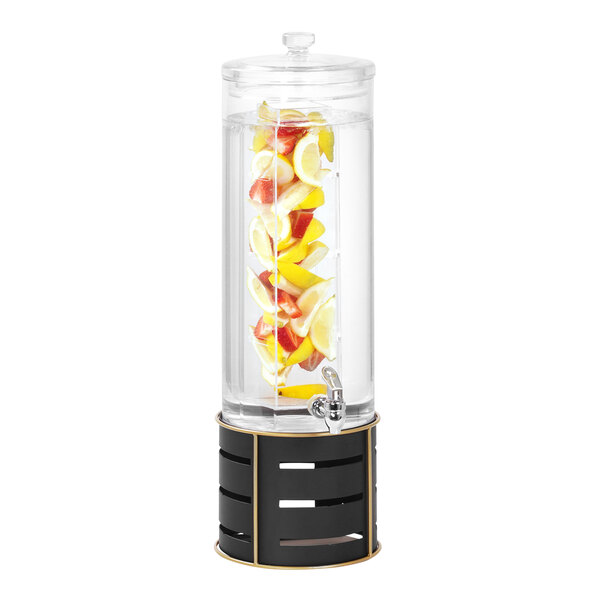 A Cal-Mil beverage dispenser with fruit in it on a black and gold metal base.