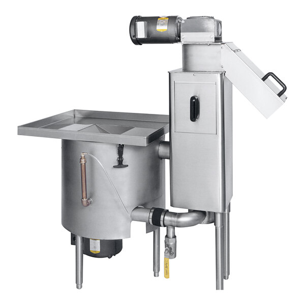A Champion pulper waste handling system over a stainless steel sink with a drain.