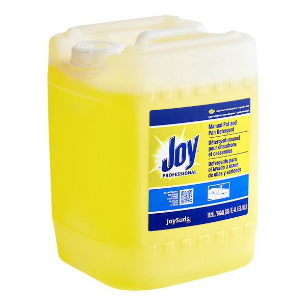 A yellow liquid in a plastic container labeled "JoySuds Joy Professional 5 Gallon Manual Pot and Pan Detergent"