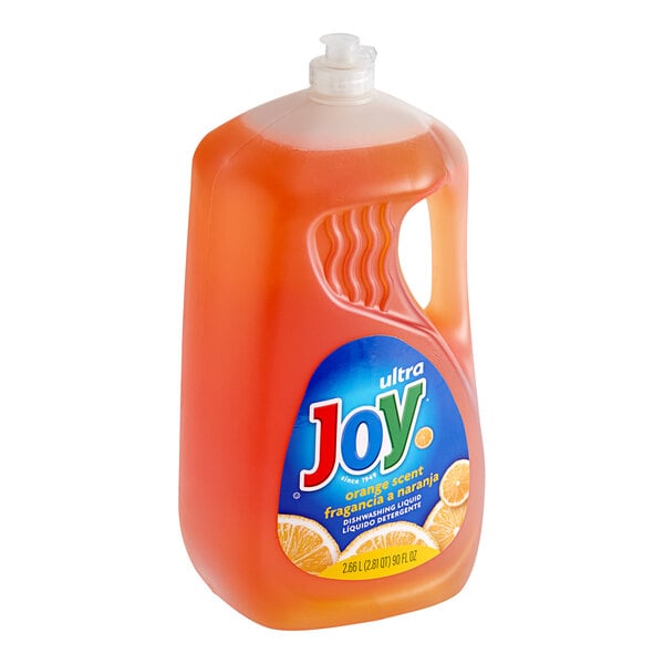 A jug of orange JoySuds dishwashing liquid.