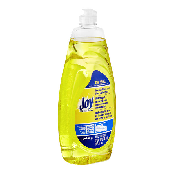 A yellow plastic bottle of Joy Professional lemon dishwashing liquid.