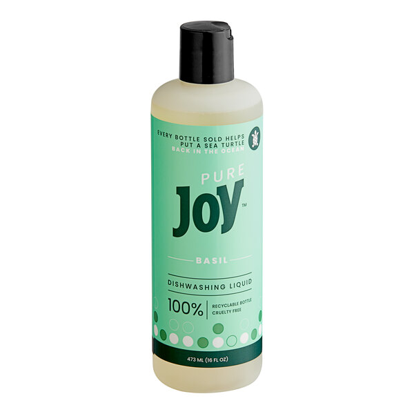 A bottle of JoySuds Basil Dishwashing Liquid with a green label.