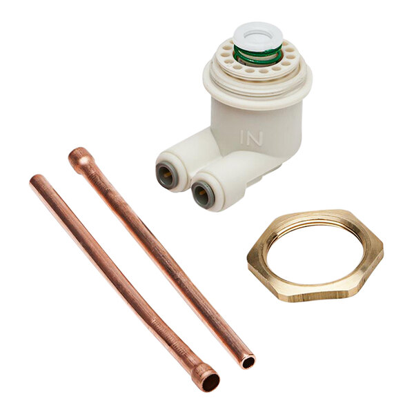 The Elkay cartridge regulator kit with green spring installed on a copper pipe.