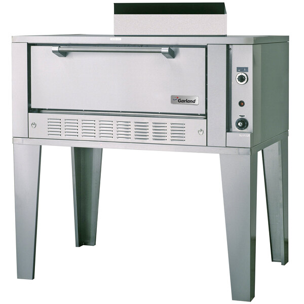 A large stainless steel Garland liquid propane roast oven on a counter.