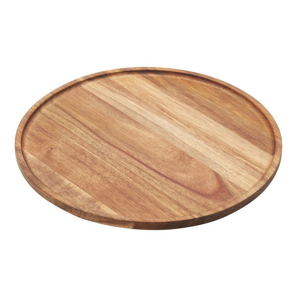 An American Metalcraft round acacia wood serving board with a handle.