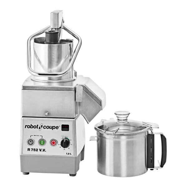 A Robot Coupe commercial food processor with a lid on a bowl.