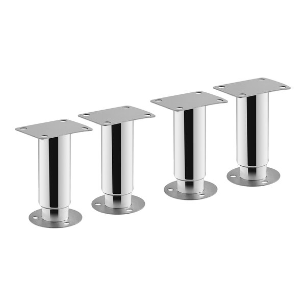 A group of silver Avantco metal legs with square metal plates.