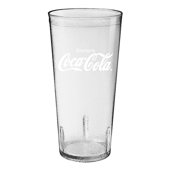 A clear Spanish Coca-Cola SAN plastic tumbler with a logo on it.