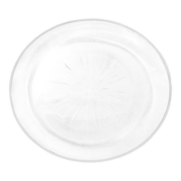 A clear glass charger plate with a white circular rim pattern.