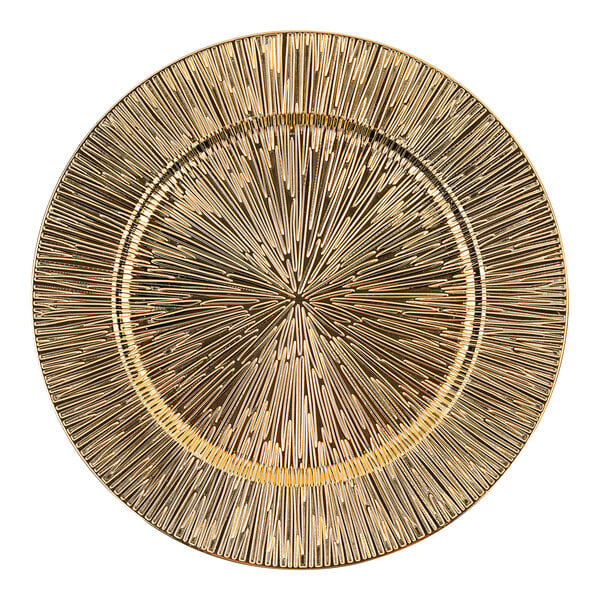 A gold American Atelier charger plate with a circular starburst pattern.
