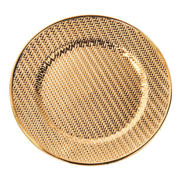 An American Atelier gold charger plate with a woven pattern.