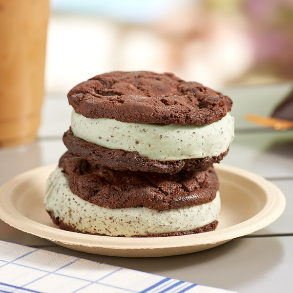 A plate of Villa Dolce Mint Chocolate Chip Gelato cookie sandwiches.