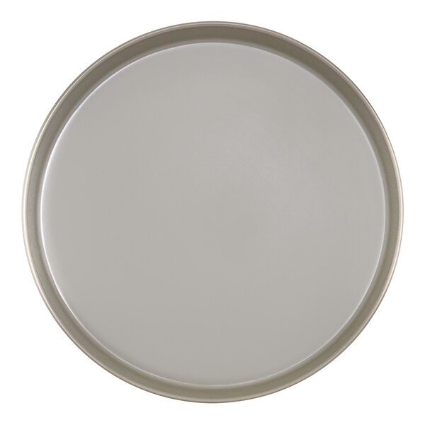 A round white plate with a grey rim.