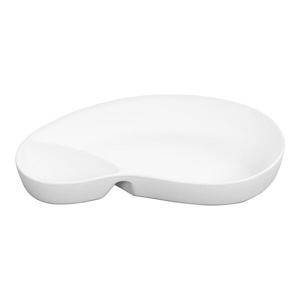 A white melamine bowl with 2 sections on a white surface.