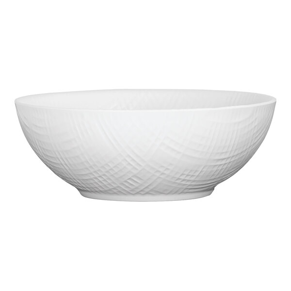 A white Cal-Mil coupe melamine bowl with a pattern.