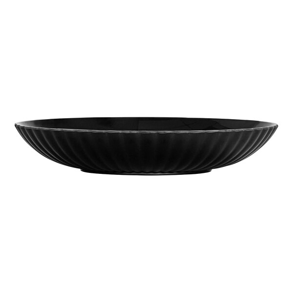 A black Cal-Mil melamine bowl with wavy white lines on the border.