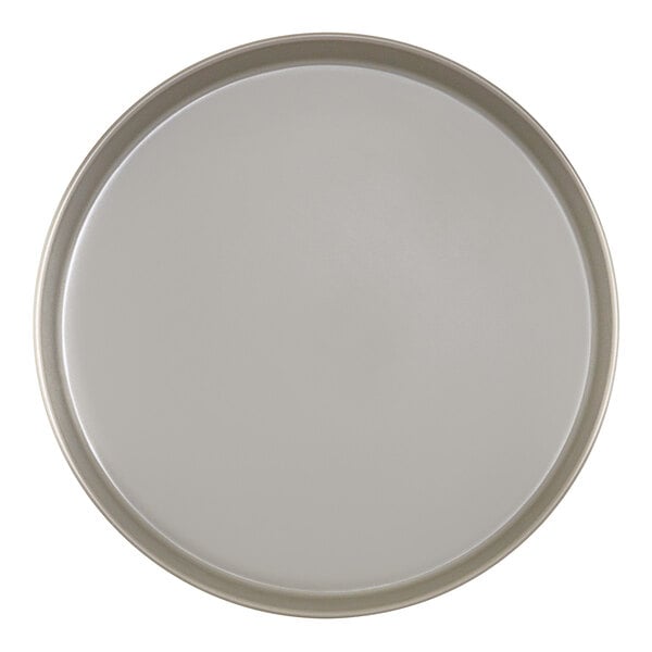 A round white plate with a grey rim.