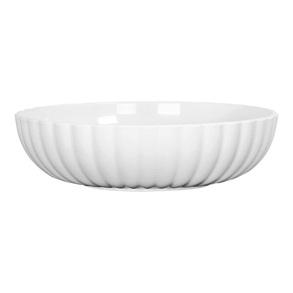 A white Cal-Mil melamine bowl with a curved design on the edge.