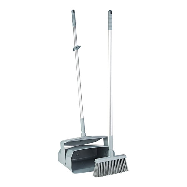 A Remco gray lobby broom and dustpan with handle.