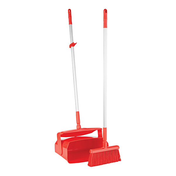 A red Remco lobby broom and dustpan set.